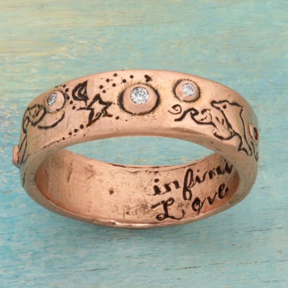 Jes MaHarry “Infinite Love Ring” in rose gold.